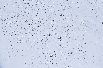 Raindrops showering on the wall
