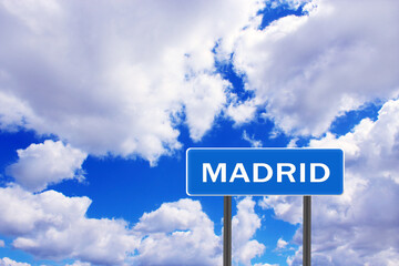 Sign with inscription Madrid with view of sky. Pointer of the settlement
