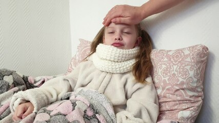 a little sick girl is measured temperature, taking care of children, colds and viral diseases