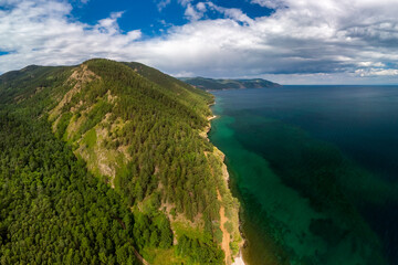 Aerial view of the coast of Lake Baikal near the Bolshiye Koty village © tilpich