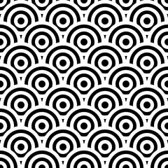 Fish scale wallpaper. Asian traditional ornament with repeated scallops. Repeated black circles and semicircles on white background. Seamless surface pattern design with rings. Vinyl motif. Vector.