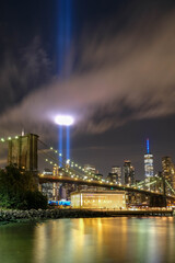 September 11 Tribute Lights. Photo from DUMBO Brooklyn New York. With One World Trade Center,...