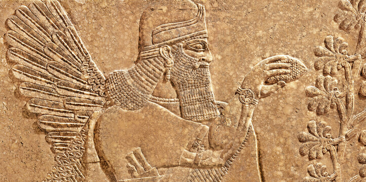 Assyrian wall relief of winged genius