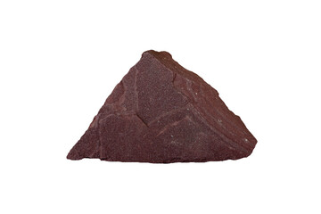 A piece of red sandstone rock isolated on  a white background. 