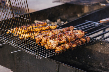 grilled barbecue kebab  street food festival meat outside charcoal heat  flame