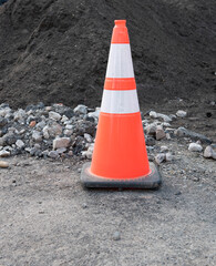 Orange caution cone for construction site.