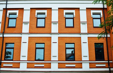 beautiful windows of a building with brickwork