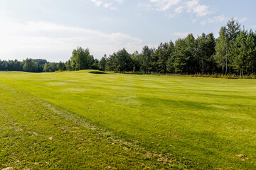 The Summer landscape golf course panorama and background. 