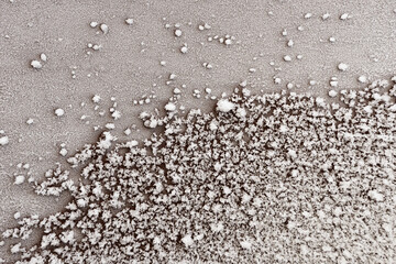 snowy abstract pattern of ice crystals on the surface