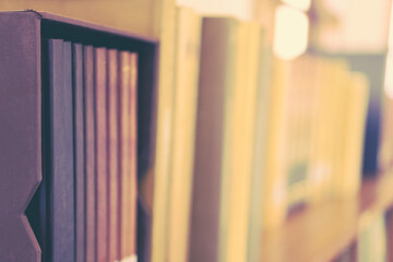 Library with books and literature in bookshelf of university or school. Knowledge education concept.