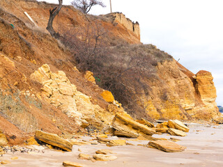 Rockslide. Mountain landslide in an environmentally hazardous area. Large cracks in earth, descent...