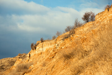 Rockslide. Mountain landslide in an environmentally hazardous area. Large cracks in earth, descent...