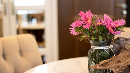 Mirrored white wardrobe, swing doors, bronze handles, close-up. Neoclassical furniture. Classic living room.