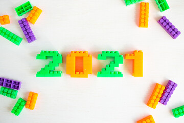 2021 bright numbers from the children's designer. Happy new year greeting card, copy space for text.