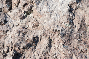 Background of mountain landslide in an environmentally hazardous area. Large cracks in the ground, the descent of soil layers, coquina. Deadly risk of coastal collapse