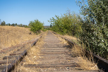 Abandoned railway on countryside close up
