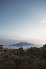sunset over capri, italy, From the top of a mountain you can see the historic island in all its glory