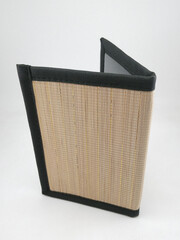 Brown weave passport holder use to insert passport