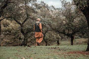 Ethnic soldier in a combat situation. Men play airsoft.