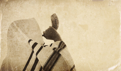 Jewish man blowing the Shofar (horn) of Rosh Hashanah (New Year). Religious symbol. Old style...