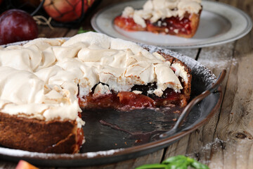 Plum cake with meringue on top