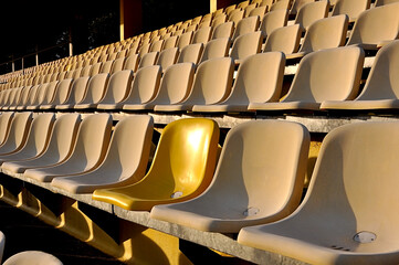 Stadium seat with one different Color, yellow, one new Seat  beside of old one © ilo