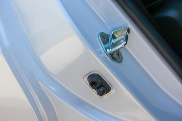 Car door latch and stopper