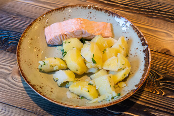 Plate of salmon with boiled potatoes