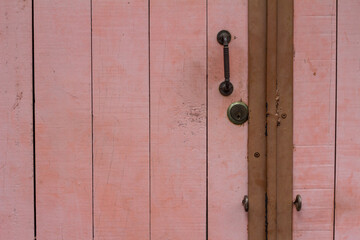 Close up old wooden door and handle