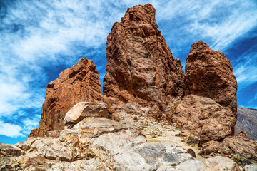 A beautiful landscape of red rocks on a blue sky at the "Roques de Garcia"