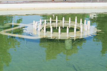 The fountain was turned off. View of the underwater part of the switched off fountain