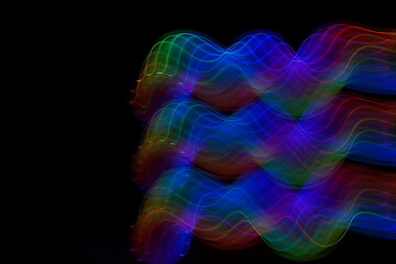 Rainbow light drawing, abstraction, waves are drawn. concept background, texture