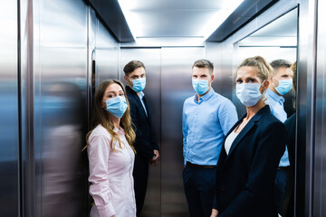 Group Of People In Elevator