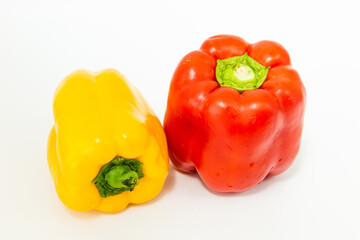yellow and red fresh bell peppers, on white background