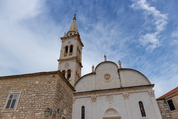 Fototapeta premium Jelsa/ Croatia-August 7th, 2020: Fascinating fortified church of St. Mary in town of Jelsa on the island of Hvar, beautiful piece of Dalmatian architecture