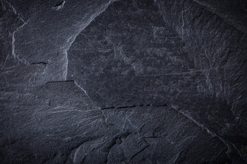 Dark grey and black slate background or texture