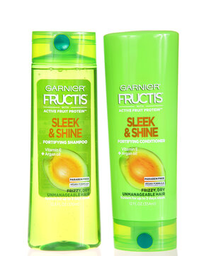 Alameda, CA - Aug 19, 2020: Bottles of Garnier Fructis brand fortifying shampoo and conditioner, isolated on white.