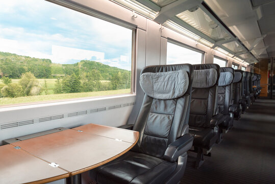 Train interior at first-class on german intercity express. Empty train seats at business class