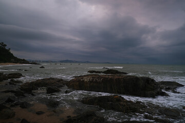 Fototapeta na wymiar clouds over the sea rocks 