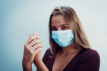 Girl Wearing mask due coronavirus wash hands