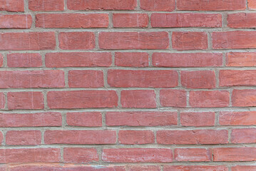 abstract background of an old restored brick wall close up
