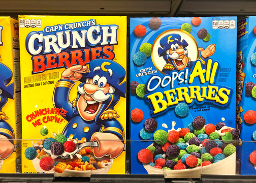 Alameda, CA - Sept 7, 2020: Grocery store shelf with boxes of Cap'n Crunch Berries and Oops All Berries cereals.