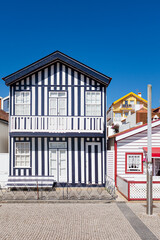 Aveiro, Portugal,  typical fishermen houses with striped colors in costa nova