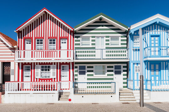 Aveiro, Portugal,  typical fishermen houses with striped colors in costa nova