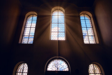 Holy light in the church window . Sun rays inside the place of worship 