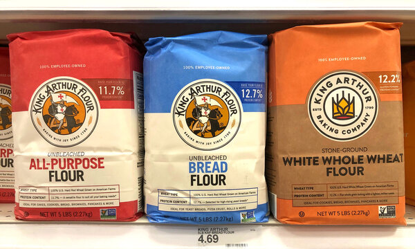 Alameda, CA - Sept 9, 2020: Grocery store shelf with five pound bags of King Arthur brand all purpose flour, bread flour and white whole wheat flour.
