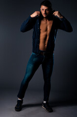 Shot of attractive young caucasian man dressed casually looking at camera