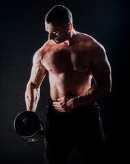 Fototapeta na wymiar Photo of muscular man on black background. Strength and motivation