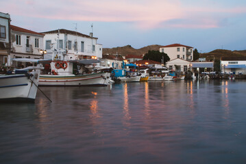 Fototapeta na wymiar boats in the harbor during sunset