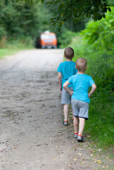 The boys saw the truck